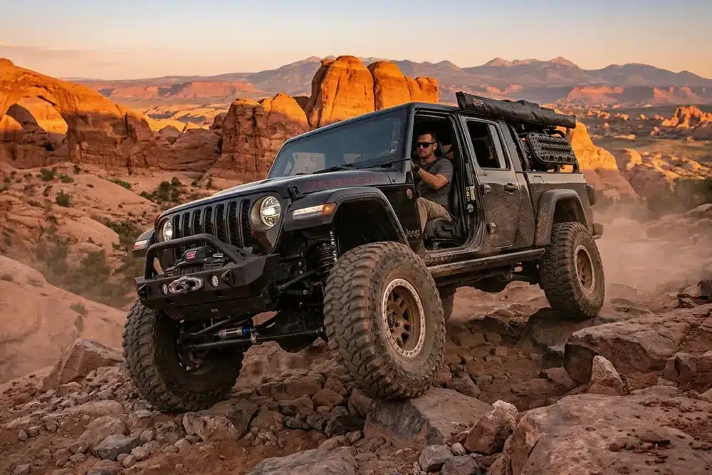 HT vs. AT vs. MT Tires: Which Is Right for You? 13 Lifted Jeep Gladiator with MT tires on a rocky desert trail