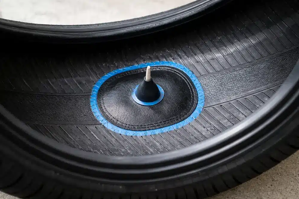 Close-up of tire repair patch