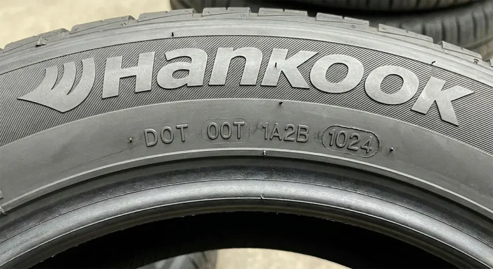 close-up of a Hankook tire sidewall showing the DOT code